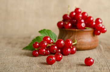 currant berries on wooden background