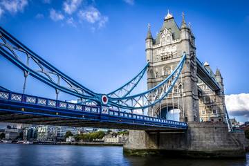 Tower Bridge crosses the River Thames close to the Tower of Lond