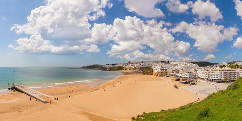 Delightful Spring panorama Albufeira beach fishermen. Portugal Algarve.