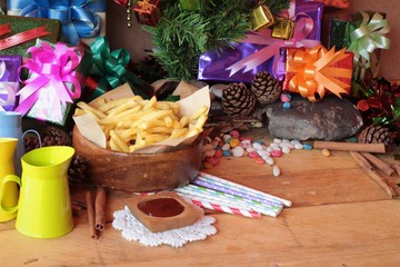 Gift boxes and french fries to celebrate Christmas.