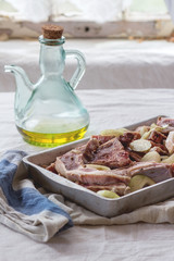 Raw lamb chops marinated