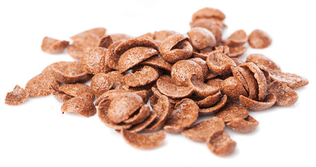 bunch of chocolate cereals on a white background