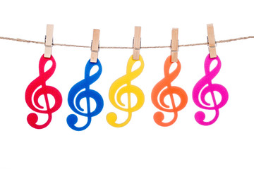Fototapeta premium clip on a twine , hanging colorful music clef