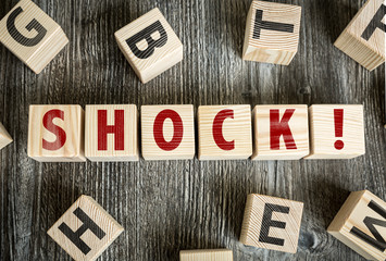 Wooden Blocks with the text: Shock!