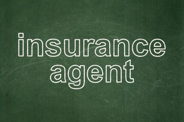 Fototapeta premium Insurance concept: Insurance Agent on chalkboard background