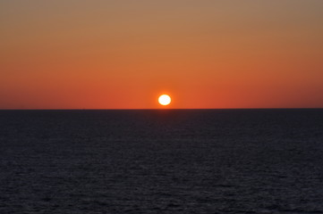 Fototapeta premium Soleil couchant sur la baie de Saint Brieuc