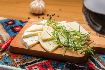 Fresh Georgian cheese homemade recipe with herbs tarragon © vdeineka