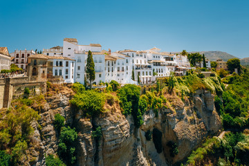 White Traditional Houses Over The Tajo De Ronda Is A Gorge Carve - obrazy, fototapety, plakaty