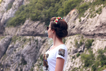 Portrait of beautiful romantic girl. Young free happy woman on bridge
