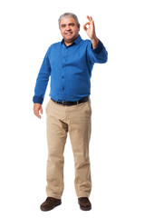 full body mature man doing a success gesture