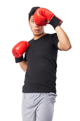 happy chinese sport man with boxing gloves