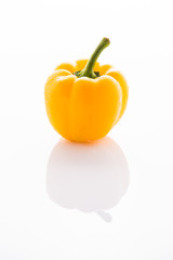 Yellow bell pepper isolated on white
