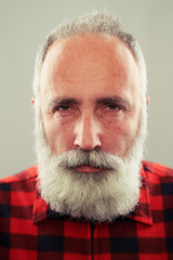 middle-aged man with grey-haired beard