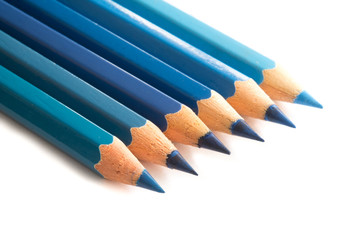 blue coloured pencils on white background