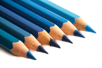 blue coloured pencils on white background