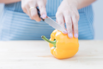 Salad preparation - cutting fresh vegetables into pieces
