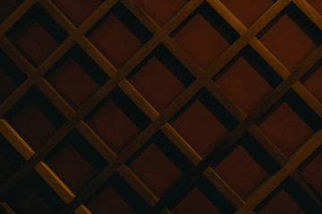 Wafer pattern in dark wood background