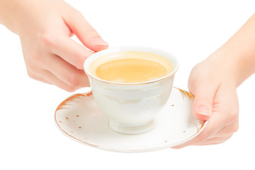cup of coffee in hand of a woman isolated on white background, high key