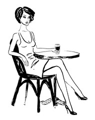 woman sitting in cafe