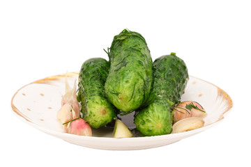 freshly-salted cucumbers isolated on white