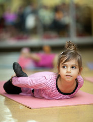 Little girl stretching