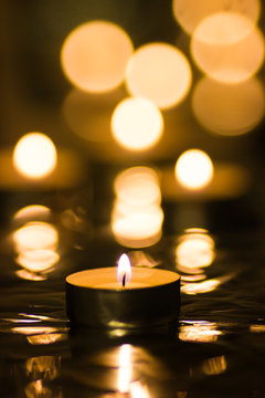 burning tea candle