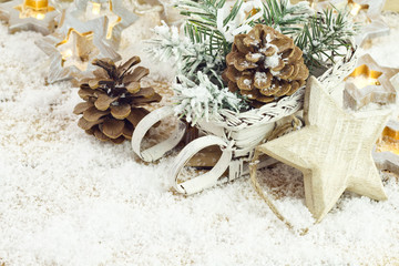 Christmas background with decoration with light star, cones and