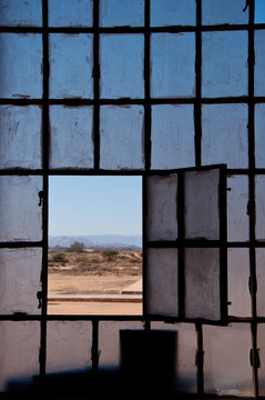 open window at Hejaz Railway station in Saudi desert near Al-Ula