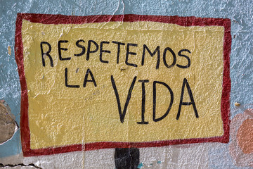 SAN JUAN, ARGENTINA, DEC 3: Colored graffiti on a wall with message - Respect Life - written in...