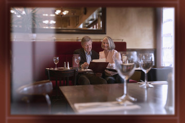 Senior couple enjoy a romantic meal together