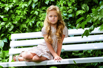kid on a bench