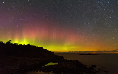 Northern lights over the sea, the starry sky, Finland, Aland Islands
