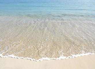 Wave on a sandy beach