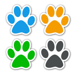 Icono plano huellas de gato con sombra en varios colores