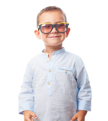 portrait of a little boy wearing retro sunglasses
