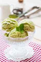Green Tea Ice Cream on white wood board