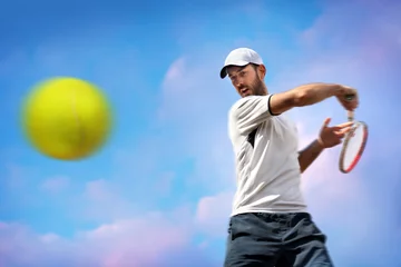 Deurstickers male tennis player in action © Mikael Damkier