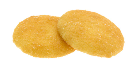 Two vanilla wafer cookies on a white background
