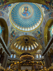 Fototapeta na wymiar KRONSTADT, RUSSIA - July 21, 2015: Interior Neo-Byzantine decoration of the Naval Russian Orthodox Cathedral of Saint Nicholas. Religious paintings and icons.