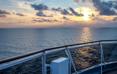 Sunset romantic view from the deck of a boat