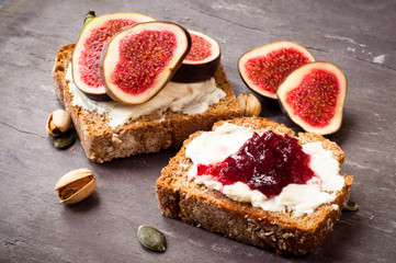 Home made Irish wheaten bread sliced and topped with cream cheese,fresh figs and jam.