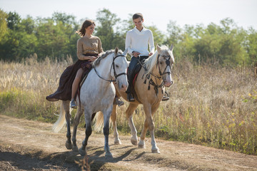 Young couple riding