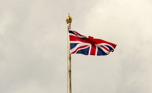 Time Lapse Tilt Shift of The Union Jack flying on a cloudy day