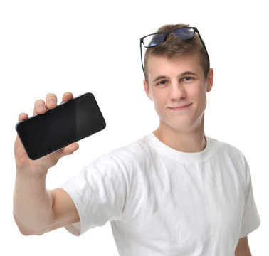 Happy Young Man Show Display Of Mobile Cell Phone With Blank Scr