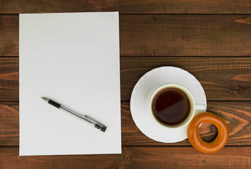 White paper on a wooden table