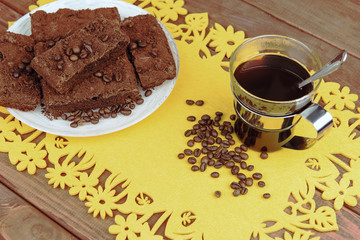 On a wooden table on yellow