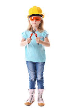 Little girl with tools isolated on white