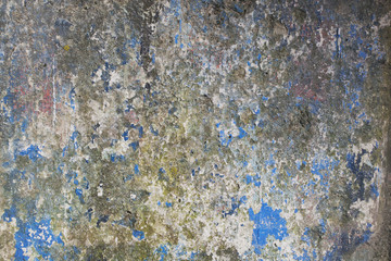 Abstract detail of an old weather worn concrete barrier.