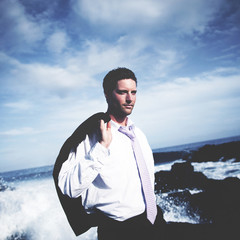 Businessman Relaxation Confusion Coastline Vacation Concept