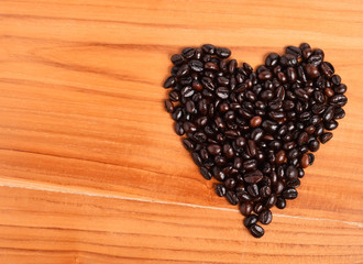 Coffee beans on  wooden background